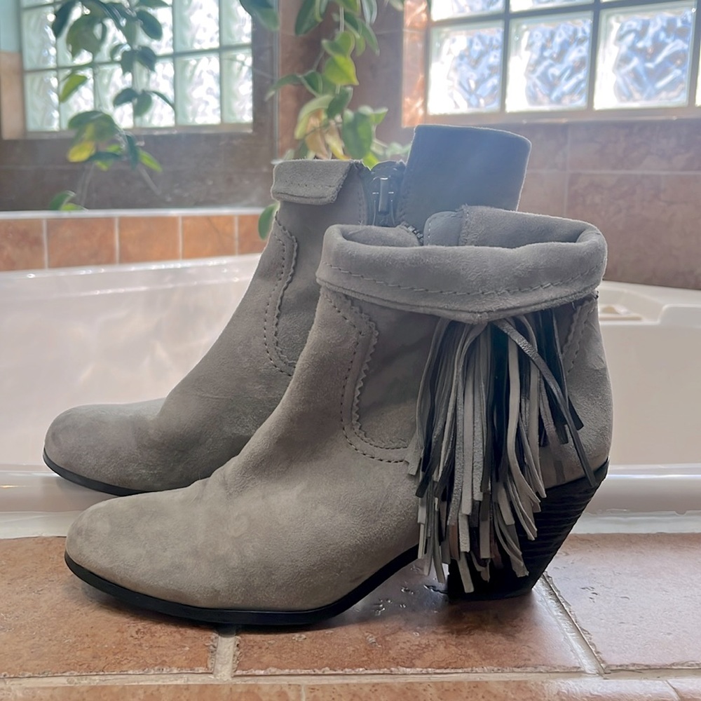 Sam Edelman silver suede boots with tassel fringe.